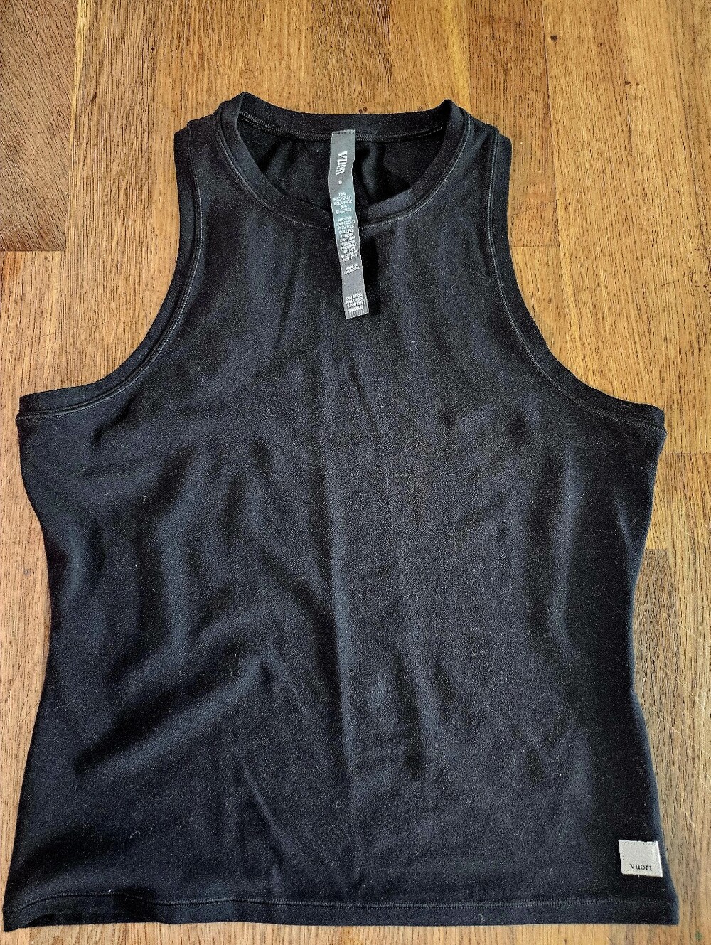 Vuori Black Athletic Top with Contrast Logo Patch. Athlecticism